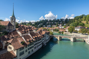 Fototapeta na wymiar Bern Old Town cityscape viewed form Nydegg Bridge above Aare River, Switzerland