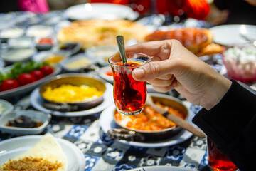 Turkish tea in traditional glass and  Breakfast plate - Stock Image