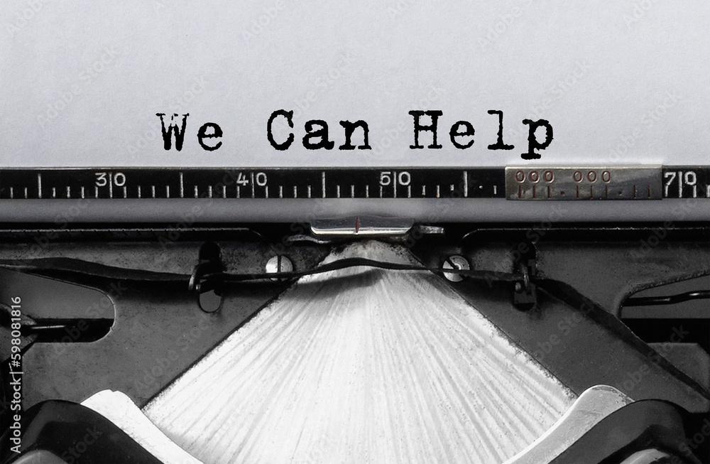 Poster text we can help typed on retro typewriter