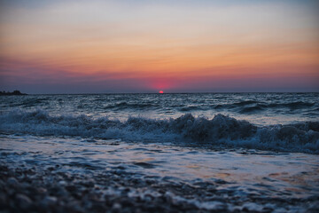 Sunset over Mediterranean Sea seen from a beach at Rhodes island