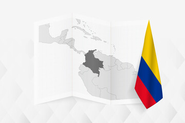 A grayscale map of Colombia with a hanging Colombian flag on one side. Vector map for many types of news.