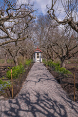 Mansion garden with a 1750s gazebo, rebuilt in a park, a sunny spring day in Stockholm