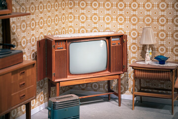 wooden television and retro interior from th 60s - 598087834