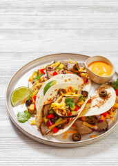 Beef Steak Tacos with veggies, avocado, corn