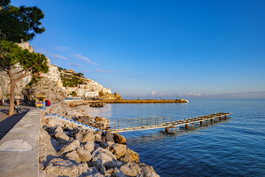 Amalfi, Italy. View of Amalfi from Via Lungomare dei Cavalieri, on a sunny winter day. 2023-12-28.