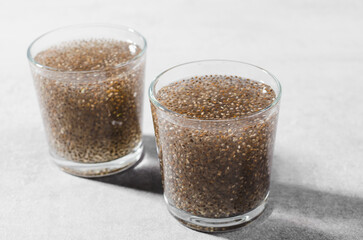 Water with Chia Seeds, Healthy Drink on Bright Background