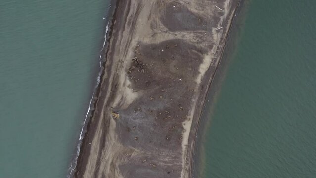 Aerial Drone Top Down shot flying over sand and whale carcasses in the Arctic Barrow Alaska 