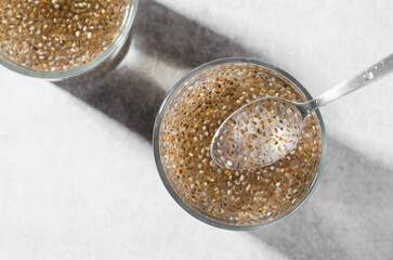 Water with Chia Seeds, Healthy Drink on Bright Background