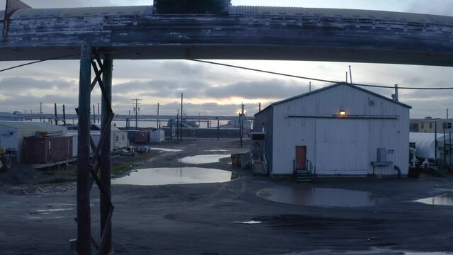 Aerial Drone shot through Flooding Climate Research Center in Thawed Permafrost Tundra of Barrow Alaska