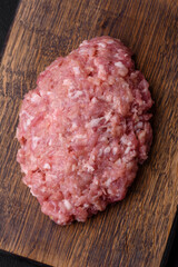 Raw minced beef, pork or chicken meat with salt, spices and herbs