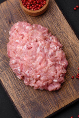 Raw minced beef, pork or chicken meat with salt, spices and herbs