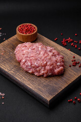 Raw minced beef, pork or chicken meat with salt, spices and herbs