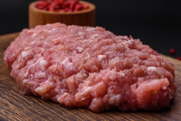 Raw minced beef, pork or chicken meat with salt, spices and herbs
