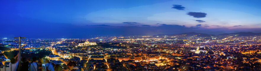 Panorama of night Great city Athens  - Greek capital with Acropolis and ships in bay