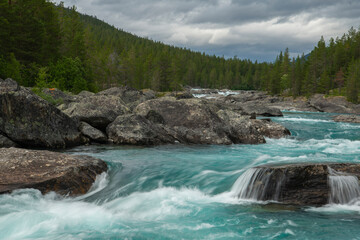 Fototapeta na wymiar Scenic Summer Time Norwegian Landscape with Mountain River