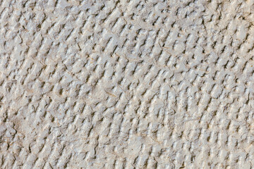 the texture of the old stone Jerusalem wall in beige color, natural stone, the photo can be used as a background
