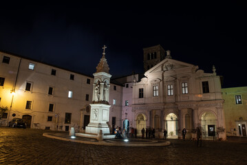 Fototapeta na wymiar Rome, Tiberina island, Basilica di San Bartolomeo all'Isola (San Bartolomew Cathedral) at night