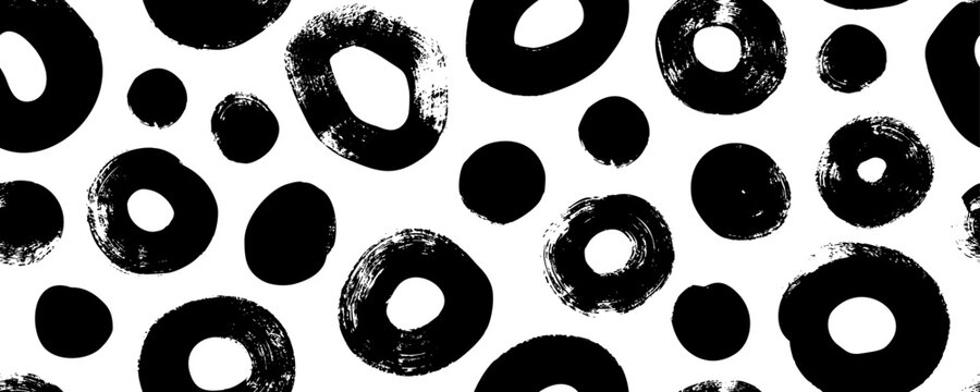 Bold irregular circles seamless pattern. Brush drawn thick spots and rough blots. Abstract geometric banner with bold round shapes. Retro organic texture. Vector dotted background.