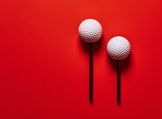 golf balls on a. red background with room for text