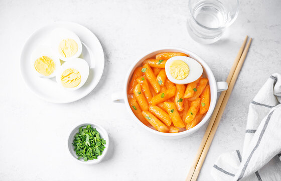 Tteokbokki. Traditional korean rice sticks in hot spicy sauce