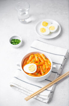 Tteokbokki. Traditional korean rice sticks in hot spicy sauce