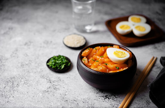 Tteokbokki. Traditional korean rice sticks in hot spicy sauce