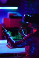 Seen from behind modern woman with laptop