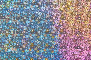 Holographic paper with a geometric pattern. Background or backdrop