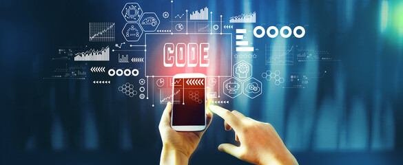 Code theme with person using smartphone