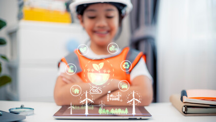 Asian little girl Works with Wind Turbine Prototype virturl, Learning about Environment and Renewable Energy. Children Working on Technology. wind energy concept. STEM Education © FAMILY STOCK