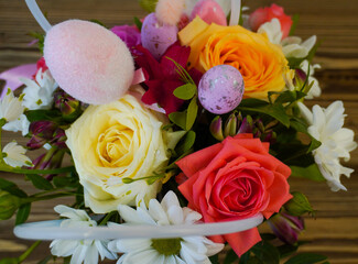 Happy easter! Flat Lay, Internet banner, postcard on Easter.  Bouquet of flowers and Easter eggs