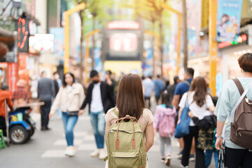 woman traveler visiting in Taiwan, Tourist with bag sightseeing and Shopping in Ximending street...