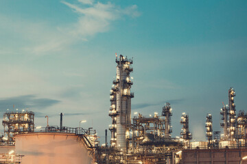 Twilight scene of tank oil refinery plant and tower column of Petrochemistry industry