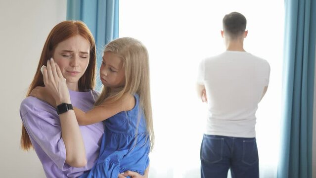 Cute child girl pity her crying mom, redhead woman has quarrel with husband, she is depressed. Generative AI