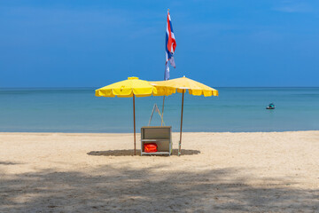 Patong Beach Phuket Thailand nice white sandy beach clear blue and turquoise waters and lovely blue skies with Palms tree