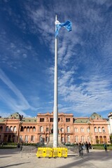 Plaza De Mayo, Iconic 19-th century Central Square in Buenos Aires Vertical Portrait with Argentian Flag on Pole and Famous Casa Rosada Building in the Background