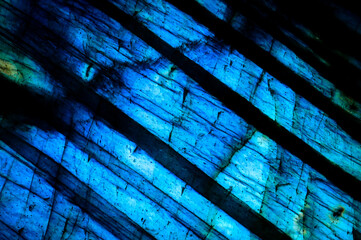 blue labradorite iridescence. macro detail texture background. close-up polished semi-precious...