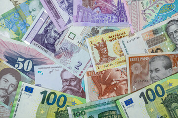 different european international money banknotes as background.
