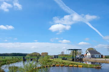 Fototapeta na wymiar Lock II over the Tjonger near Jubbega, Friesland || Sluis II over de Tjonger bij Jubbega, Friesland