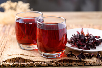 Roselle tea in glass with dried roselle, Herbal drink for reduction in blood pressure