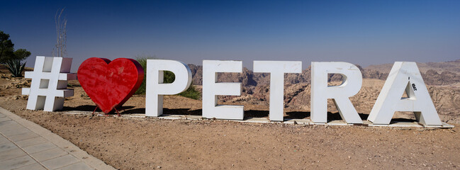 Hashtag I Love Petra Sign in Jordan Panorama with Inscription in Big Letters on a Viewpoint