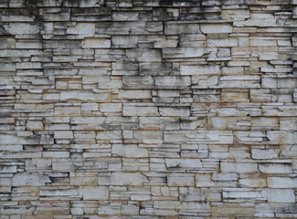 Old stone wall texture background for interior exterior decoration and industrial construction concept design.