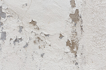 Old wall with peeling plaster