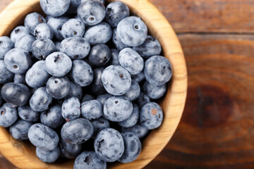 blueberries on a wooden background