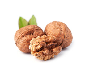 Walnuts with leaves on white backgrounds