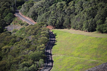 Road cut through countryside from elevated view