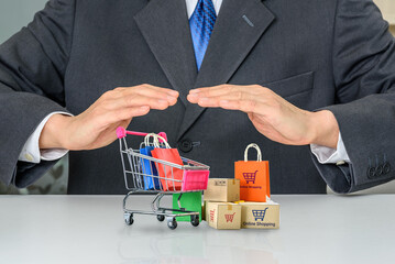 Consumer rights and consumer protection, business law concept : Buyer protects bags and boxes of...