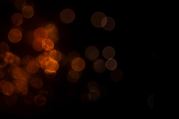 Abstract background with gold sparkling bokeh, disco, festive backdrop for design.