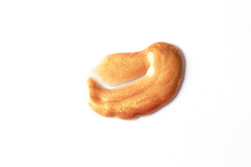 Gold bronze shimmer smear, lotion, bronzer, highlither, blush swatch on white background.