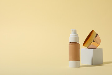 Concept of cosmetic and make up accessories - foundation, space for text